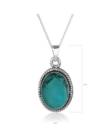 Pendentif Turquoise sertie collerette d'argent massif