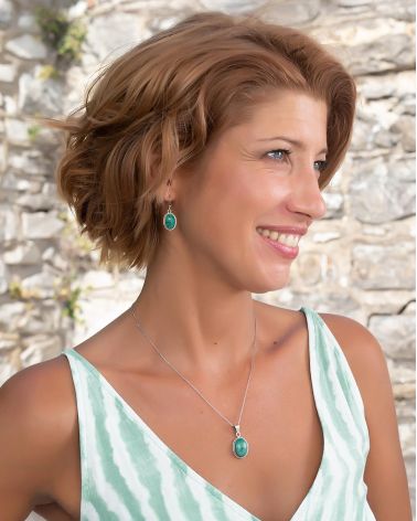 Pendentif Turquoise sertie collerette d'argent massif