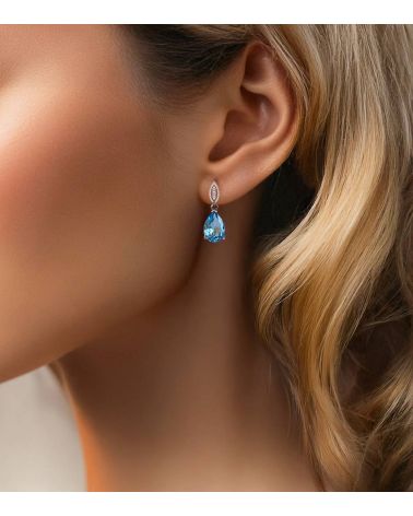 White Gold and Blue Sky Topaz Earrings Worn – Ultimate Refinement